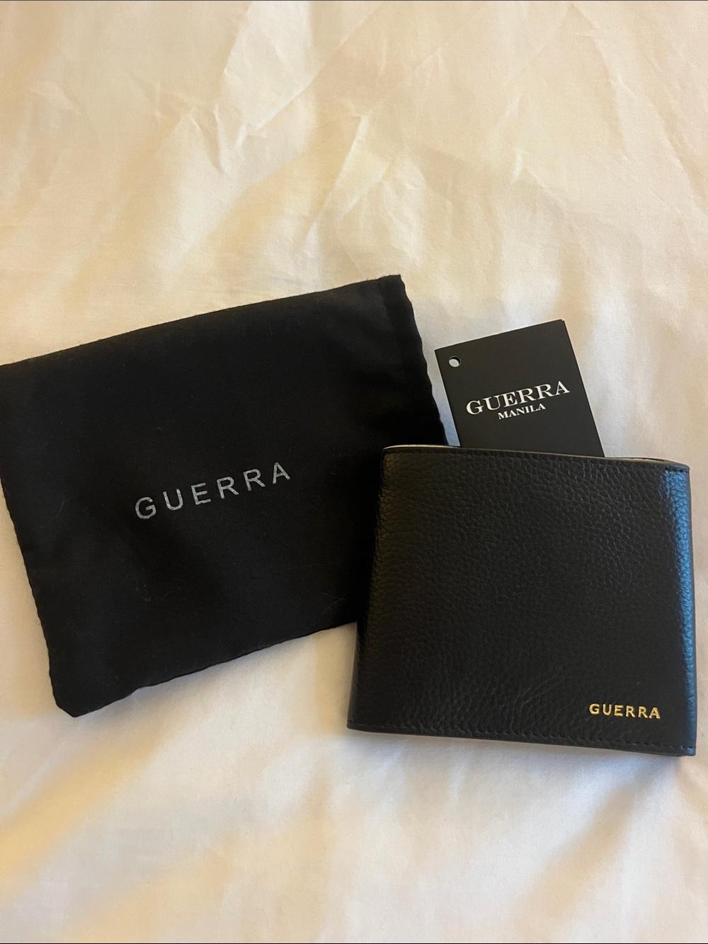 Guerra 100% Leather wallet. Black w/cream interior.  Pockets for EVERYTHING! NWT